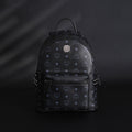MCM Stark Visetos Medium Backpack – Black Monogram with Studded Detailing