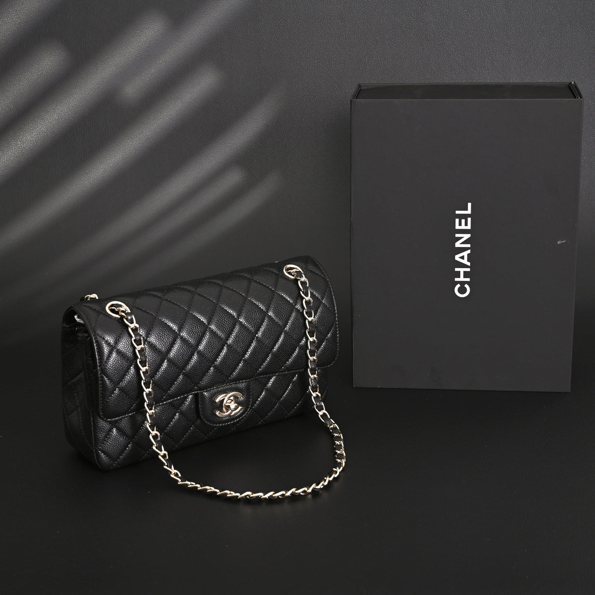 Chanel Classic Flap Bag – Black Quilted Caviar Leather with Gold-Tone Hardware