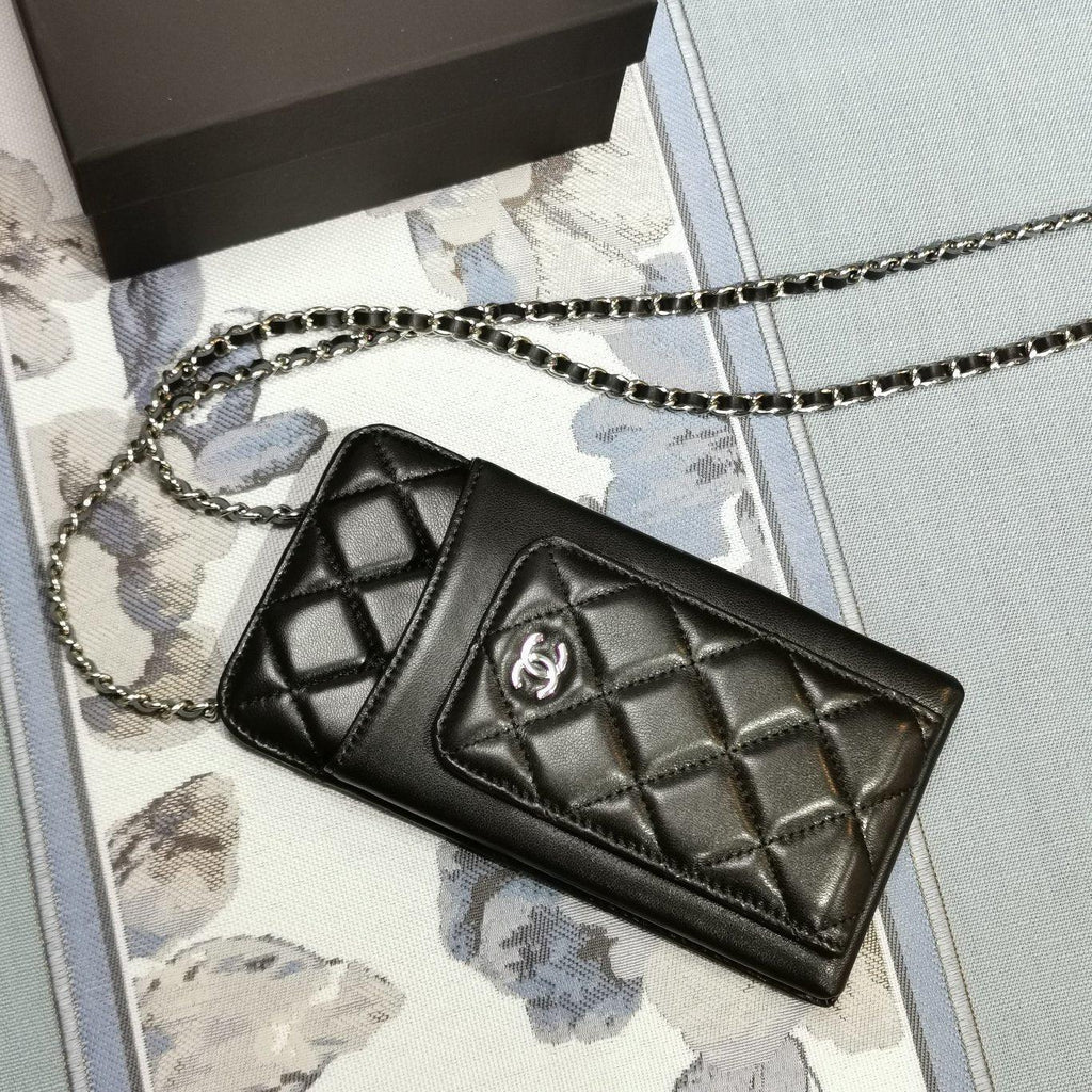 Chanel quilted phone holder wallet